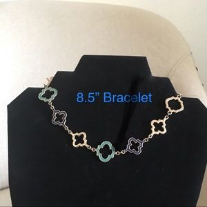 Initials Inc Gold tone bracelet with enamel